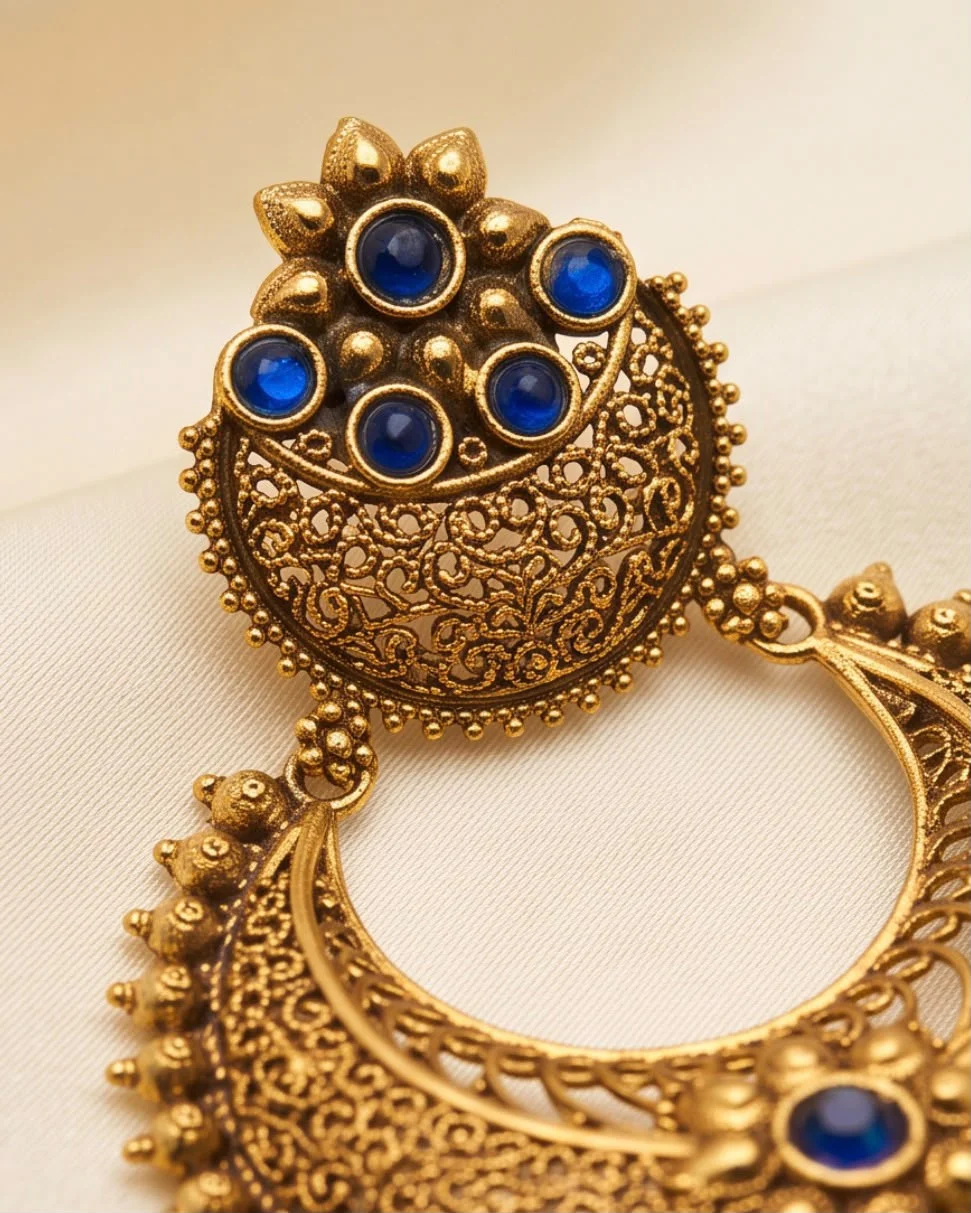 EARINGS GOLD SHADE WITH BLUE STONE