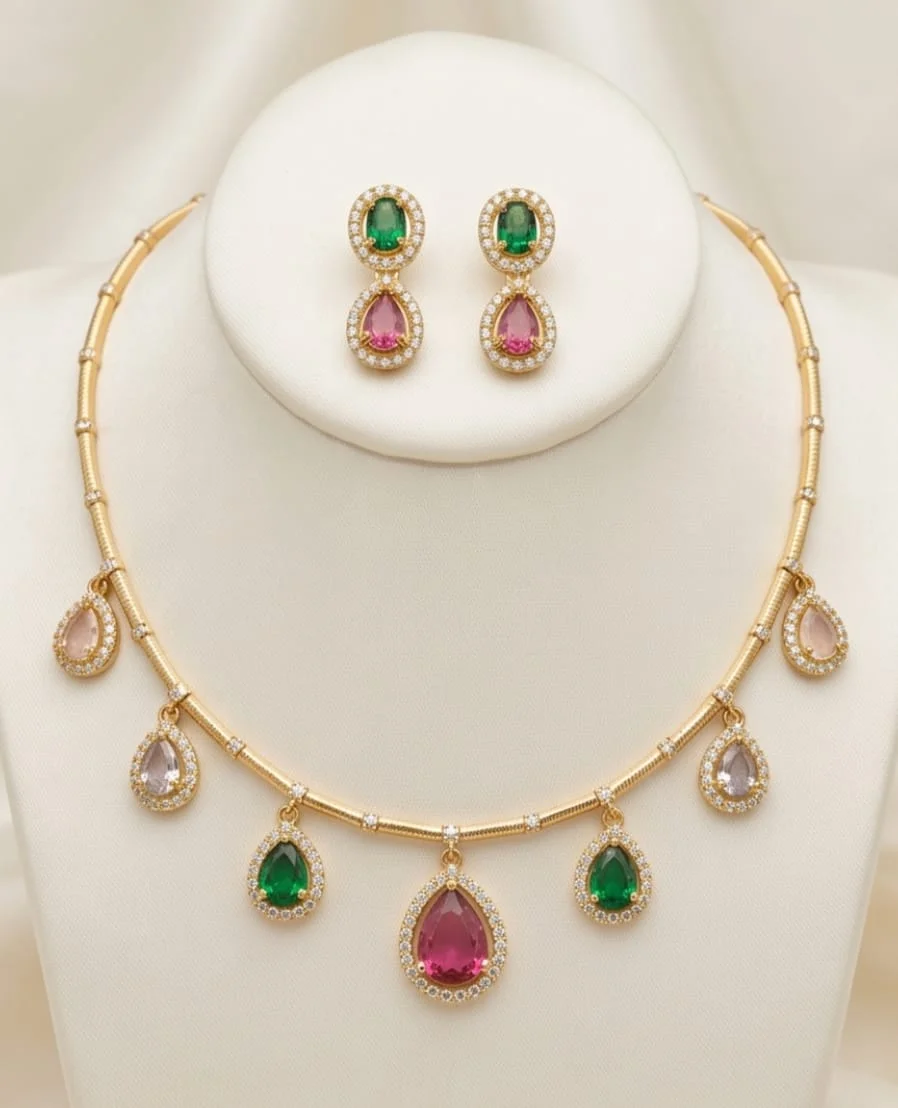 A Modern Traditional South Asian Collar Necklace With A Matching Two Tier Drop Earrings