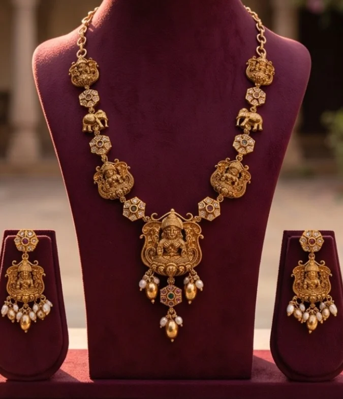 Antique Matte Gold Finish Necklace Set.The Pendant And Alternating Links Feature An Intricate Relief Carving Of Goodness Lakshmi.
