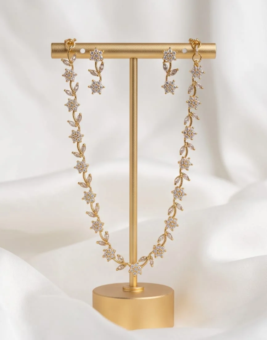 This Gold Plated Floral Vine Necklace Features Sparkling White Cubic Zirconia Crystal Flowers And Leaf Shaped Accents. alternate view