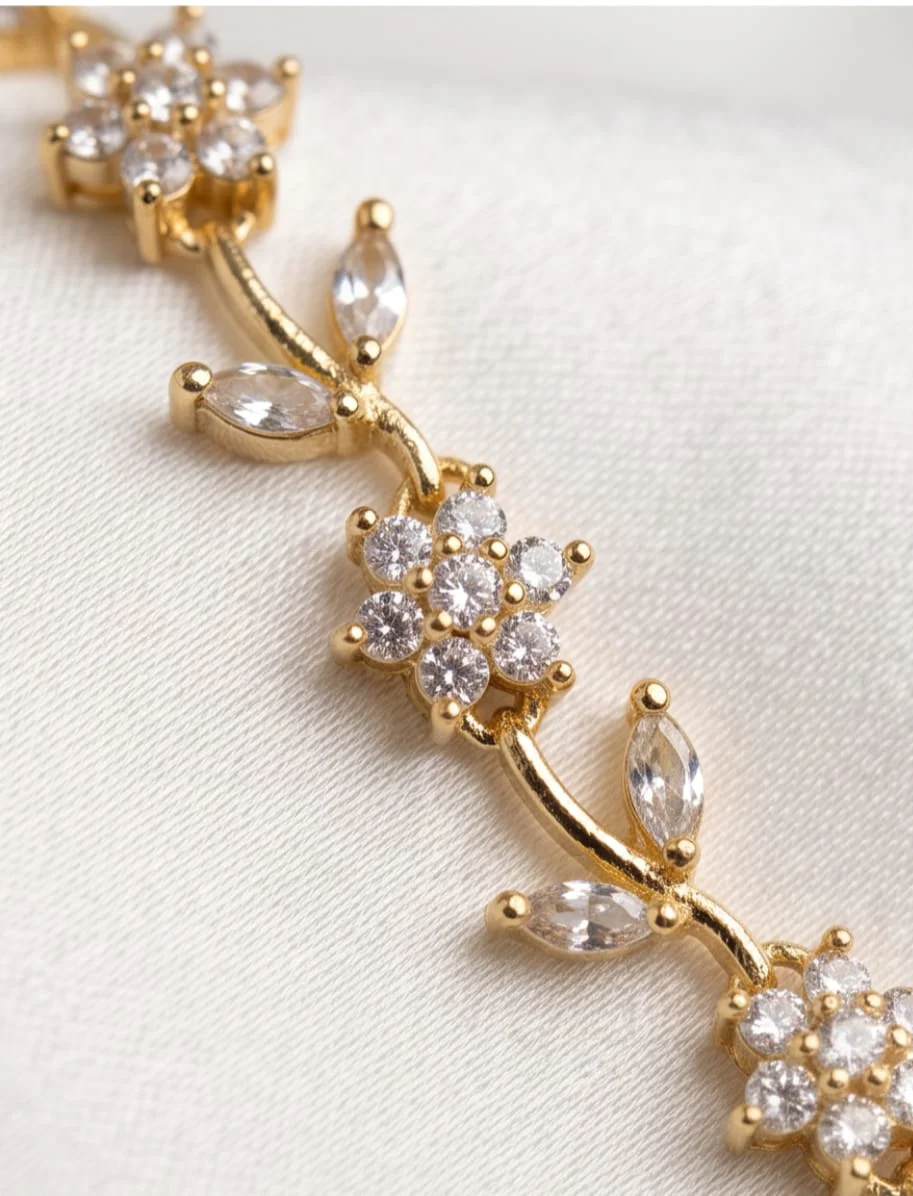 This Gold Plated Floral Vine Necklace Features Sparkling White Cubic Zirconia Crystal Flowers And Leaf Shaped Accents. view 3