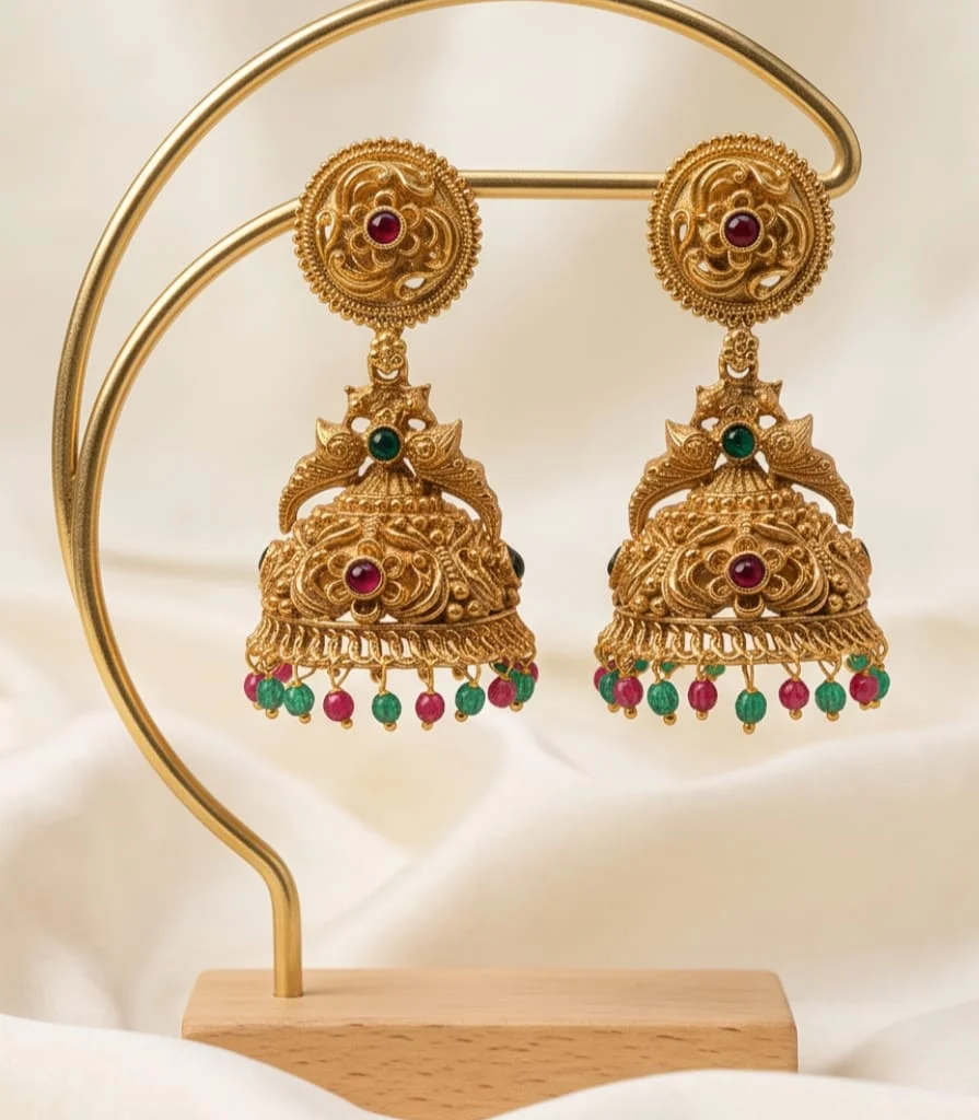 Antique Gold Plated Temple Jhumka Earrings Feature Peacock Motifs