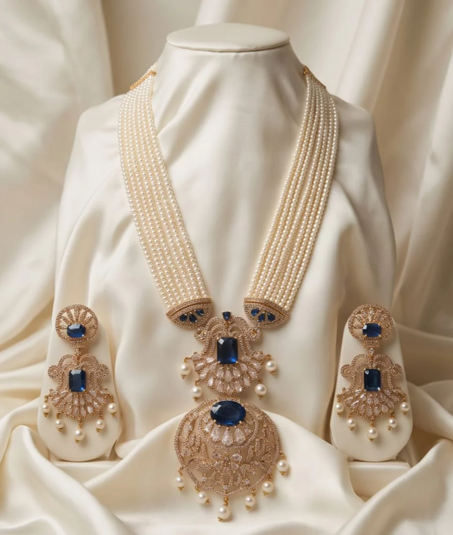 This Elegant Multi-Strand Pearl Necklace And Matching Drop Earring Set