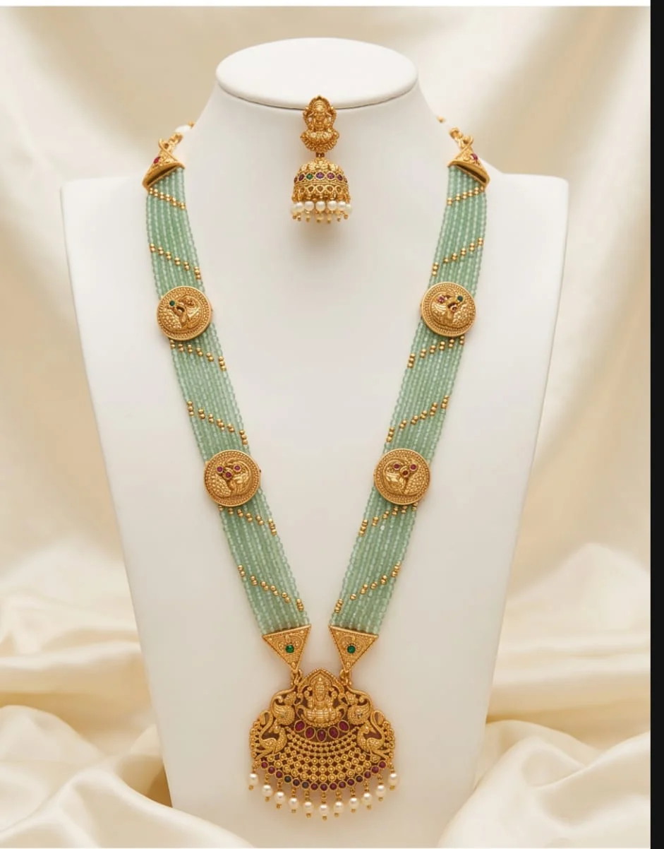 This Mint Green Beaded Traditional Temple Jewellery Set Features An Antique Gold Tone Goddess Lakshmi Pendant And Matching Pearl Accented Jumka Earrings. alternate view