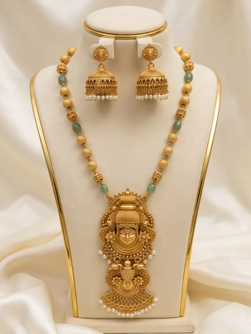 This Is An Ornate Antique Gold Finish Kathakali Double Face Pendant Long Haram Accented With Delicate Green And Gold Beads