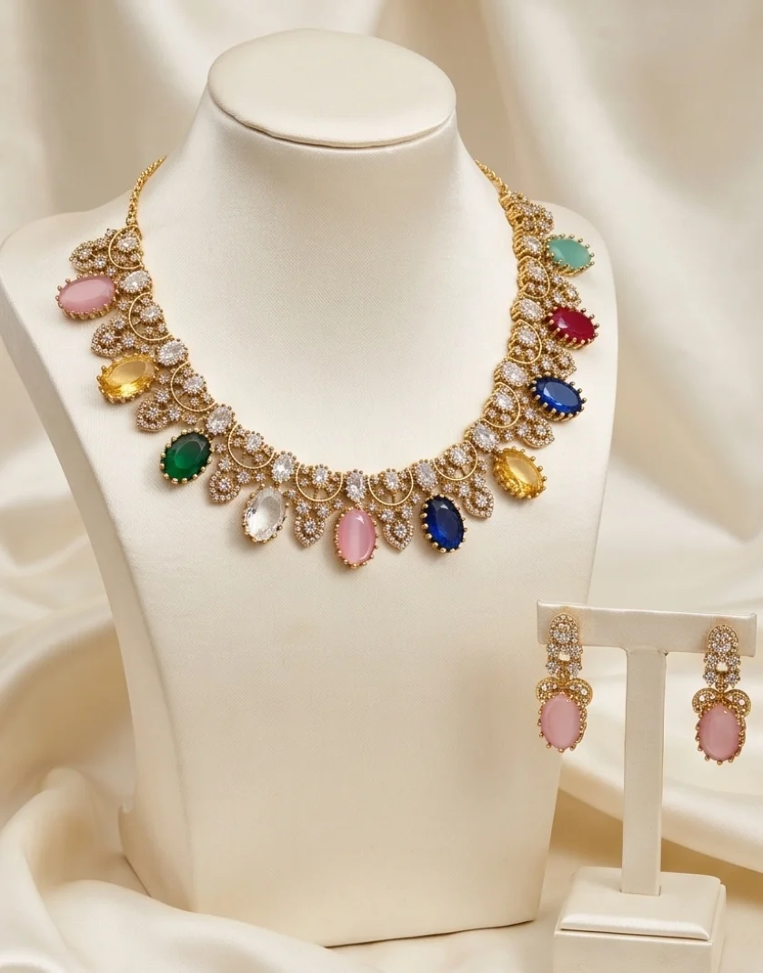 Necklace Incorporates Oval Cut Synthetic Or Semi Precious Cabochons And Faceted Stone In A Rainbow Palette.