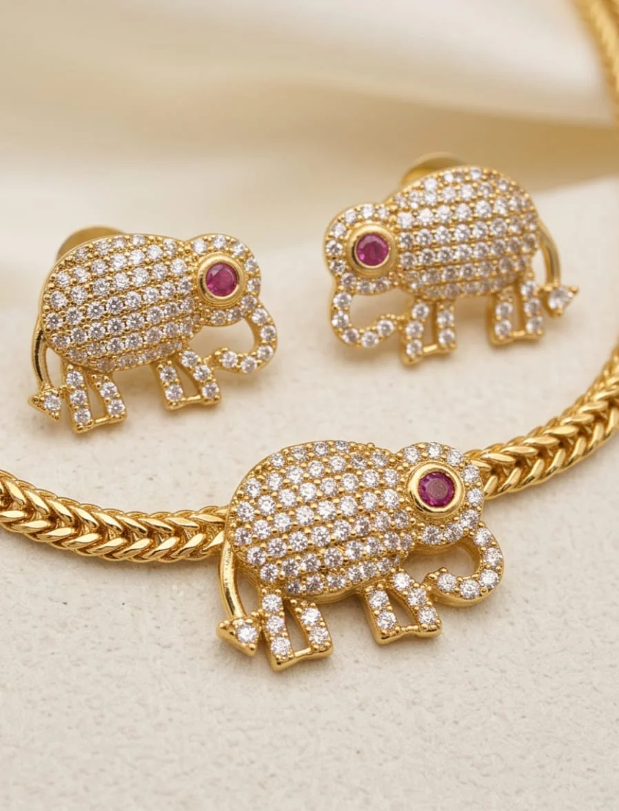 This Stunning Gold-Plated Elephant Motif Necklace Set, Beautifully Adorned With Sparkling CZ Stones And Matching Stud Earrings.  Perfect For Festive Occasions, Weddings, Traditional Functions & Special Celebrations A Timeless Blend O alternate view