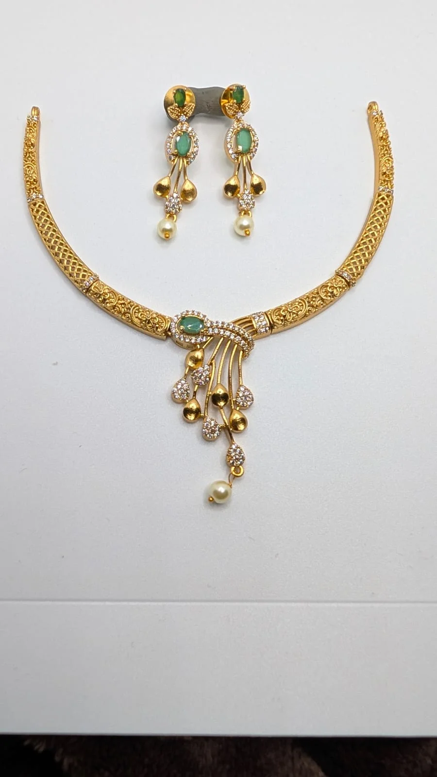 Gold-Toned Choker Necklace, Beautifully Embellished With Sparkling Cubic Zirconia And Rich Emerald-Green Centre Stones. view 4