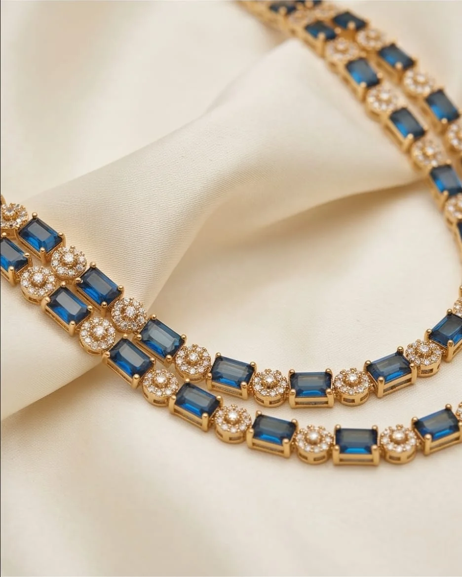 This Is A Gold-Plated Layered Necklace And Matching Earring Set Featuring Vibrant Emerald-Cut Navy Blue Stones view 3